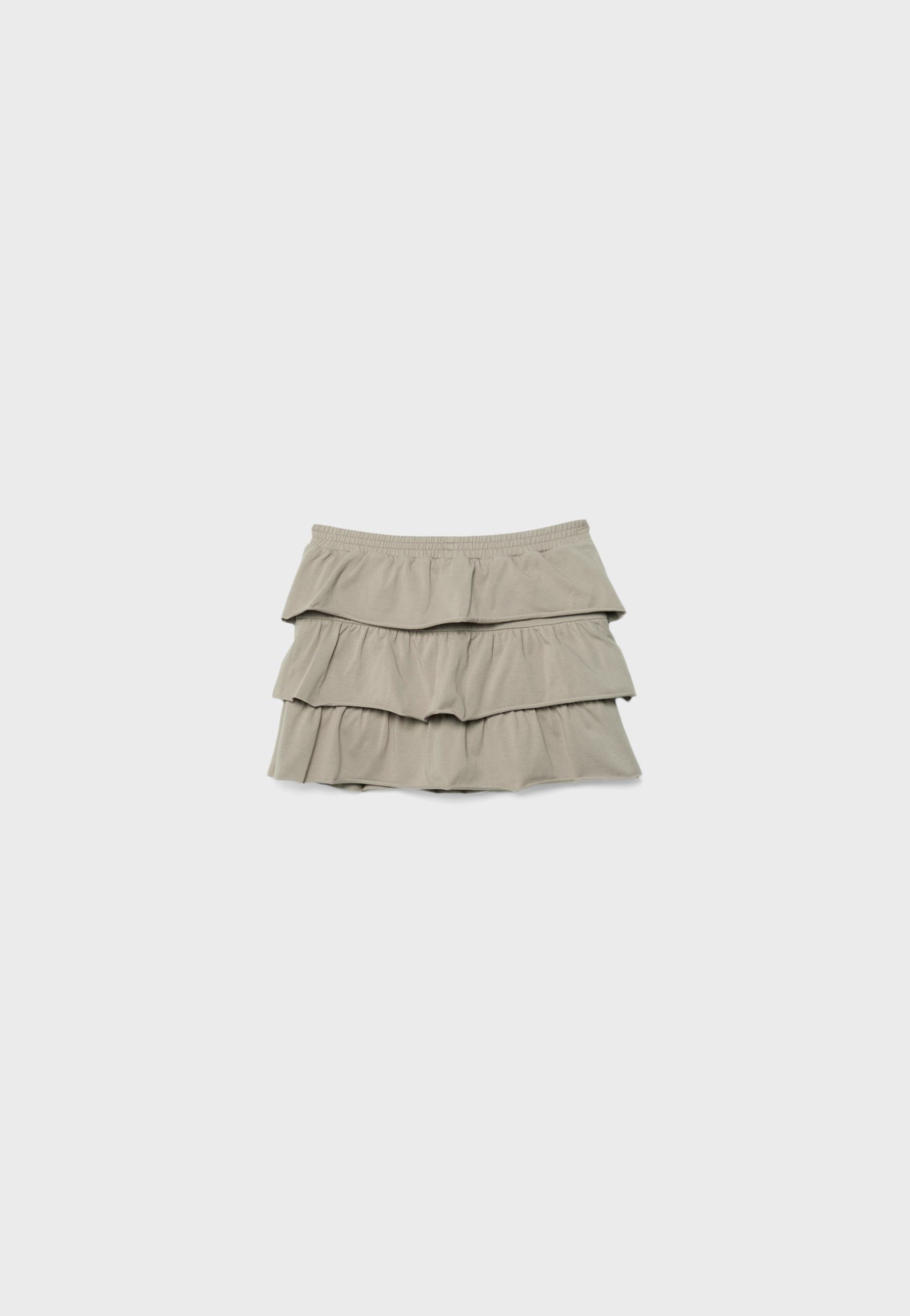 Ruffled positional knit skirt — Beige
