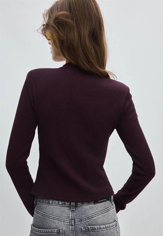 chaqueta punto hombreras