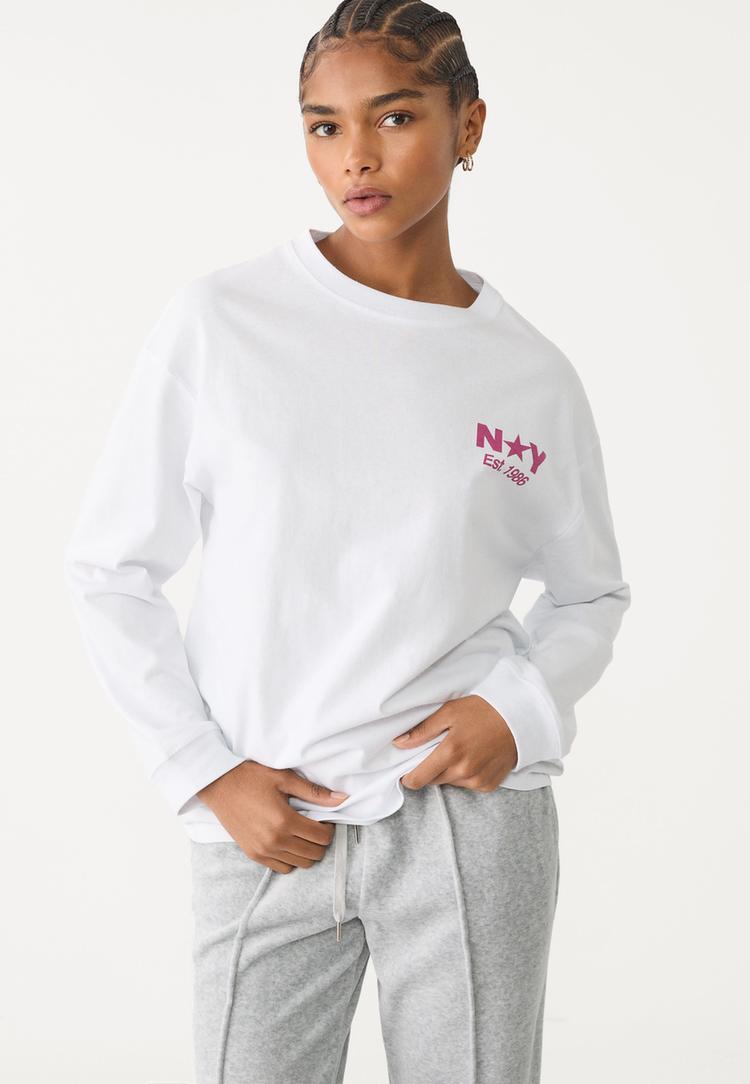 top a manches longues motif place