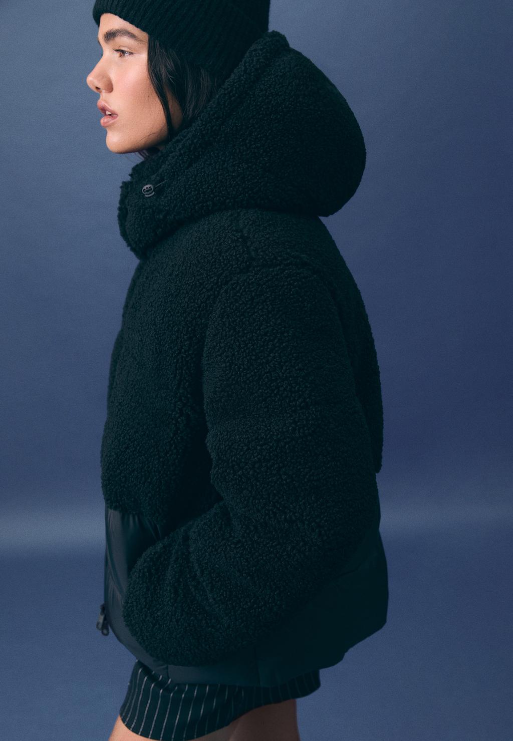 معطف مبطن من فرو الغنم الاصطناعي مدمج