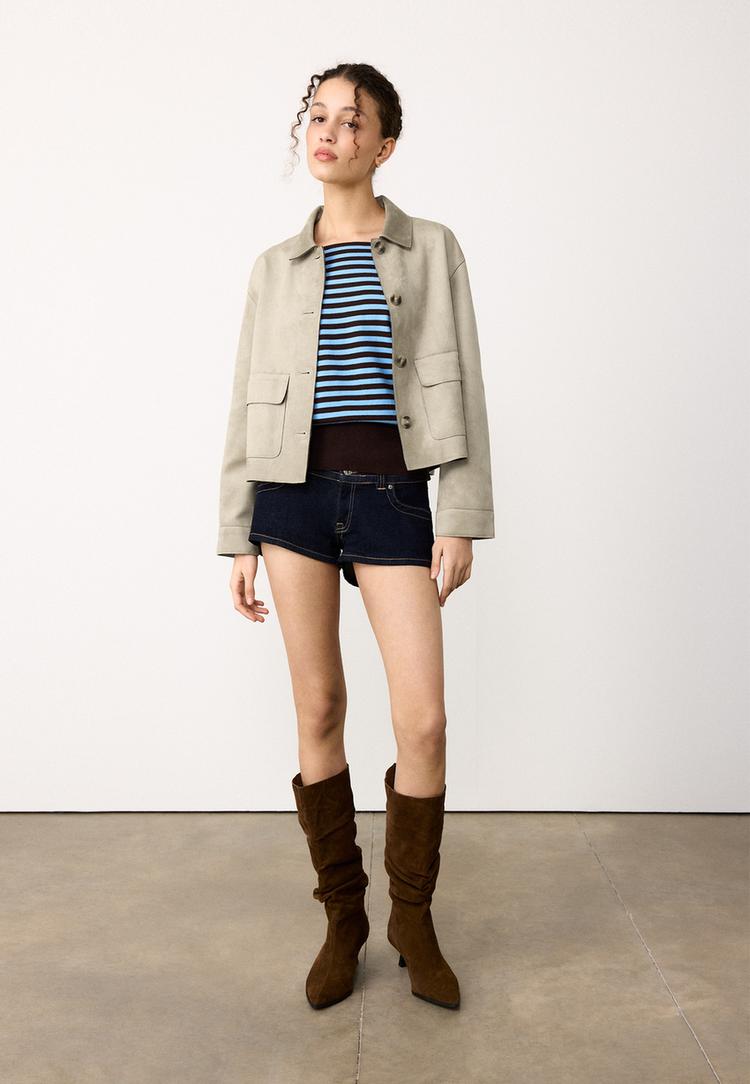 jack met zakken van imitatiesuede