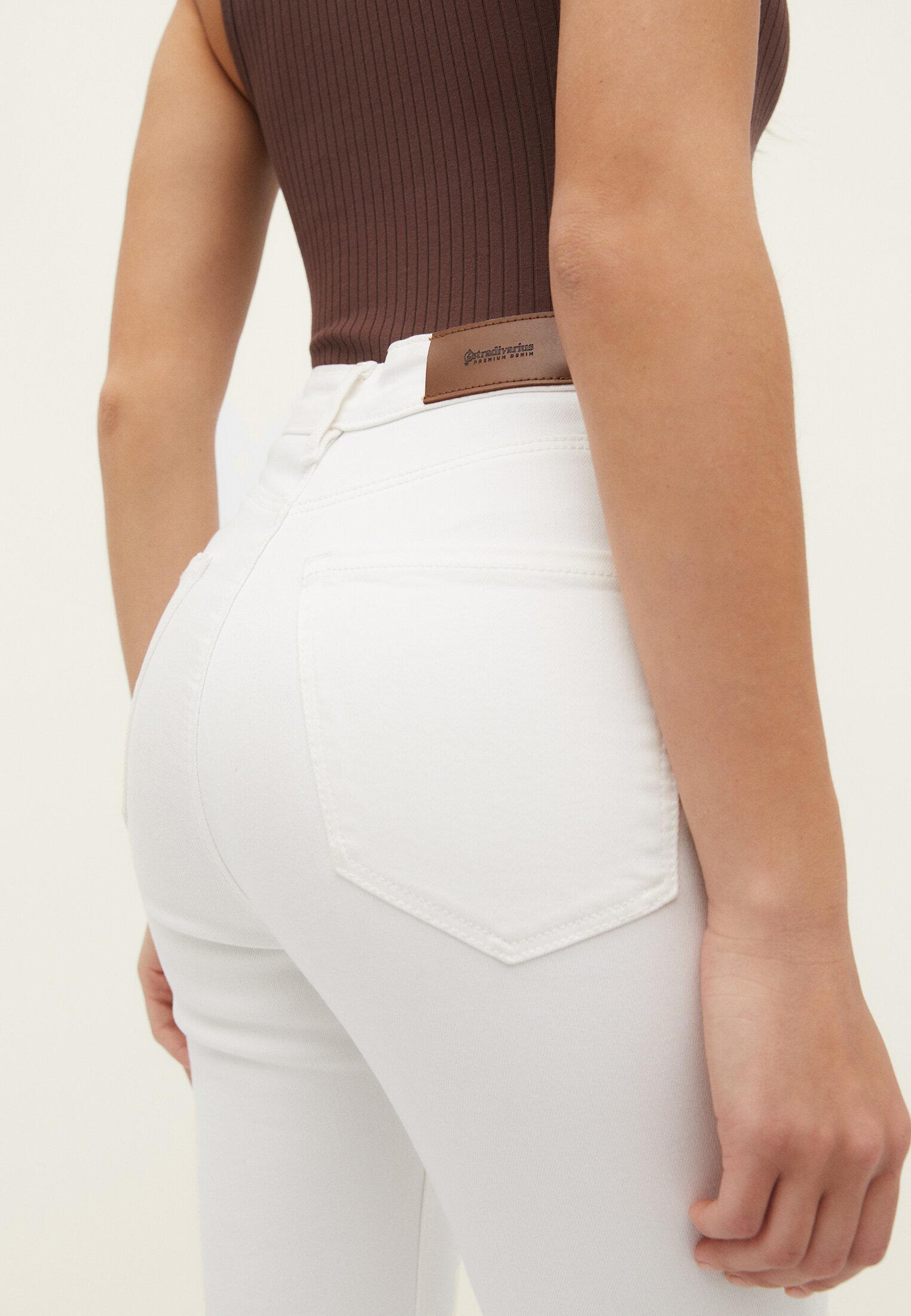 D78 cropped flared jeans — White