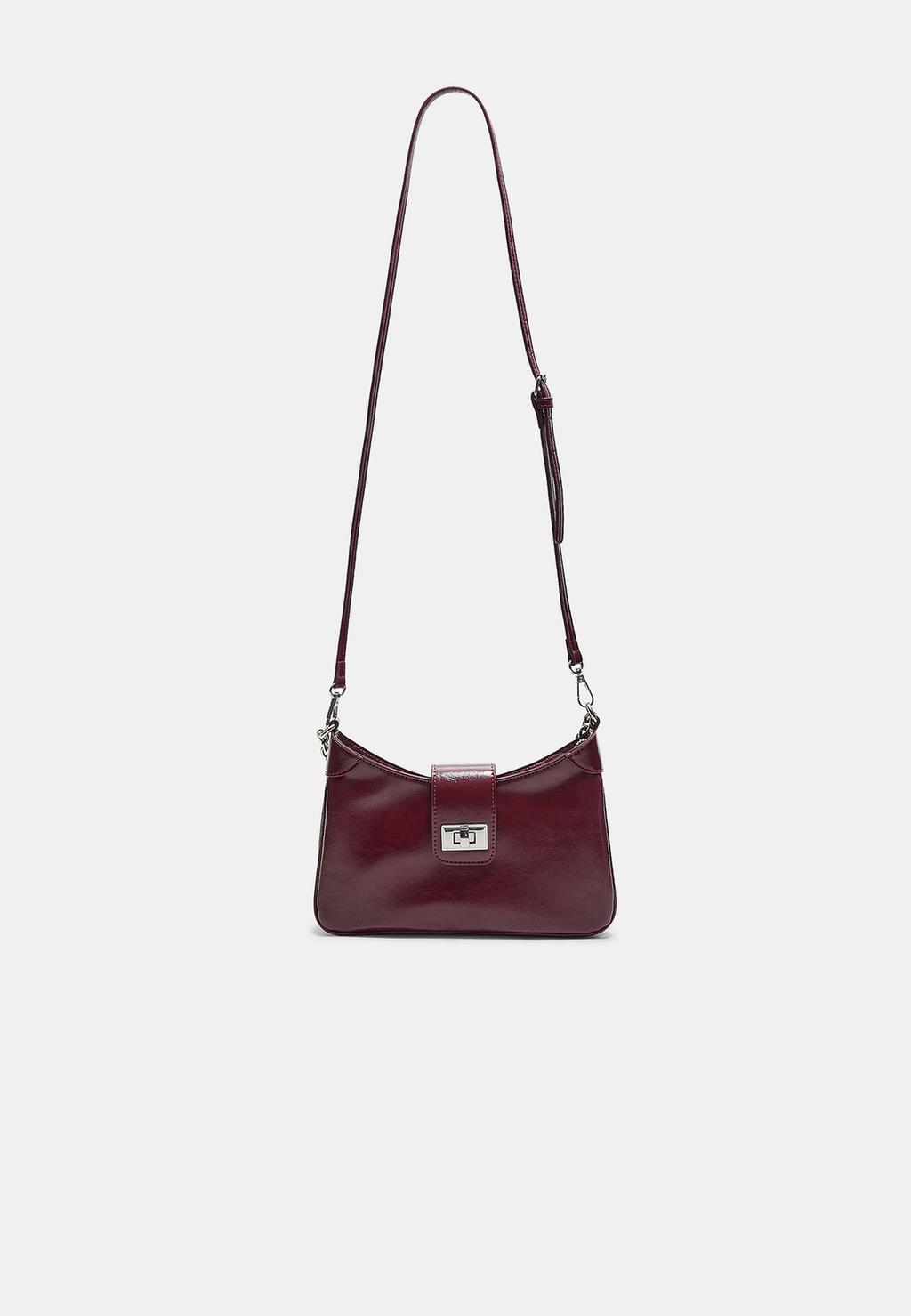 Crossbody bag with metal fastening