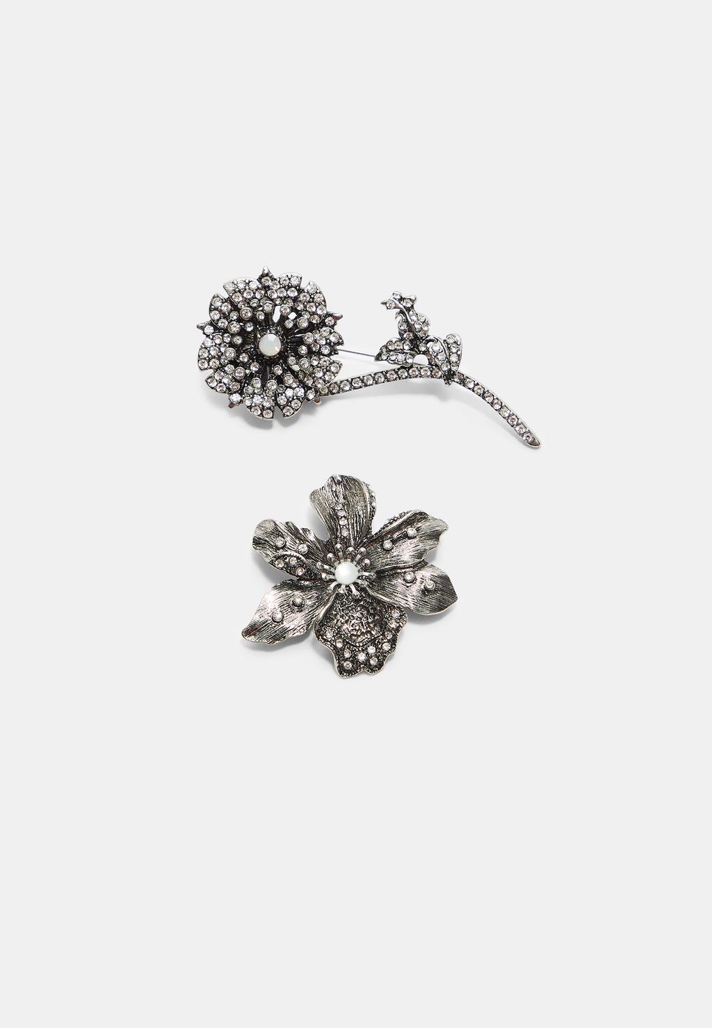 Set 2 pins flores brillos