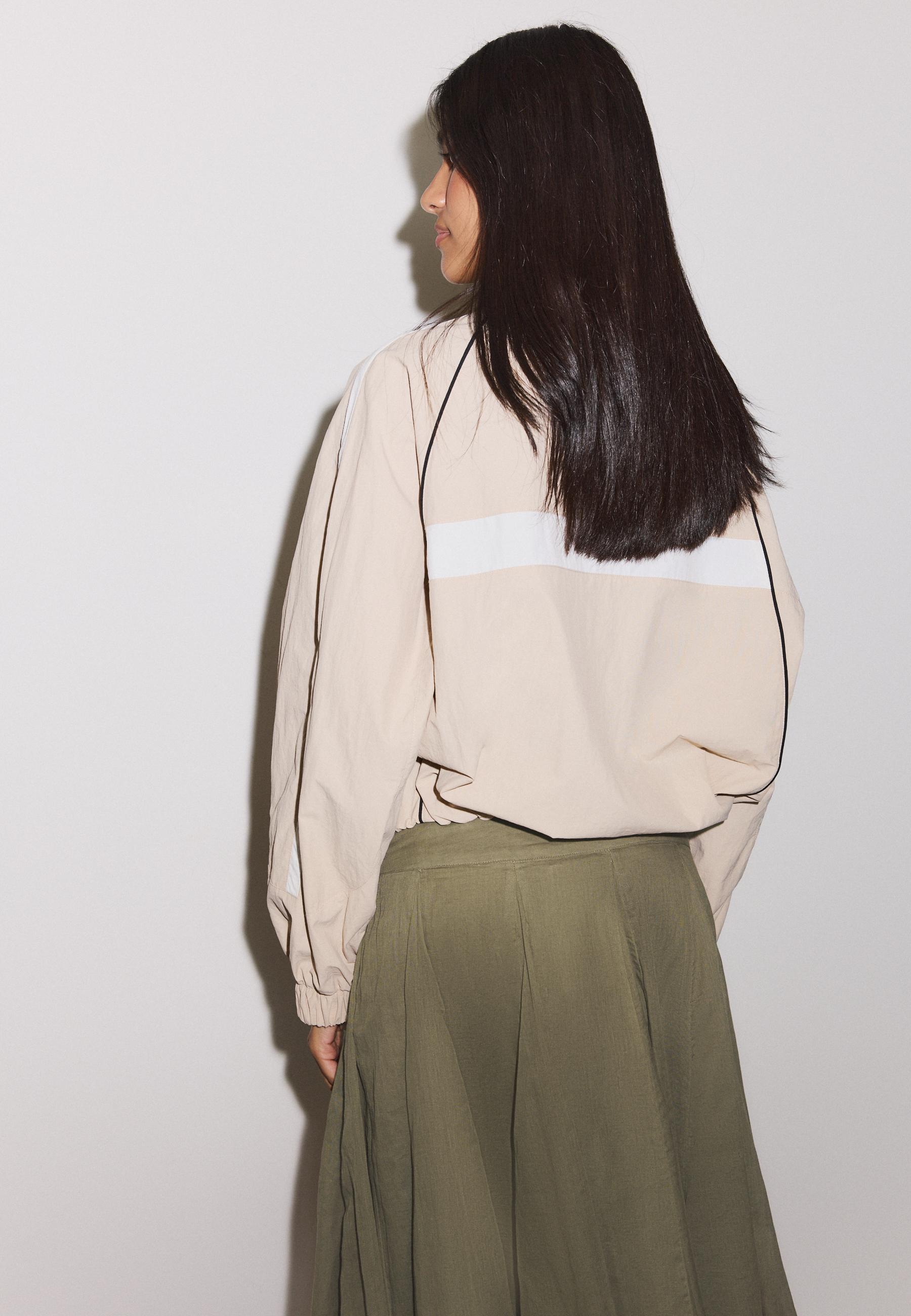 Technical windbreaker jacket — Stone