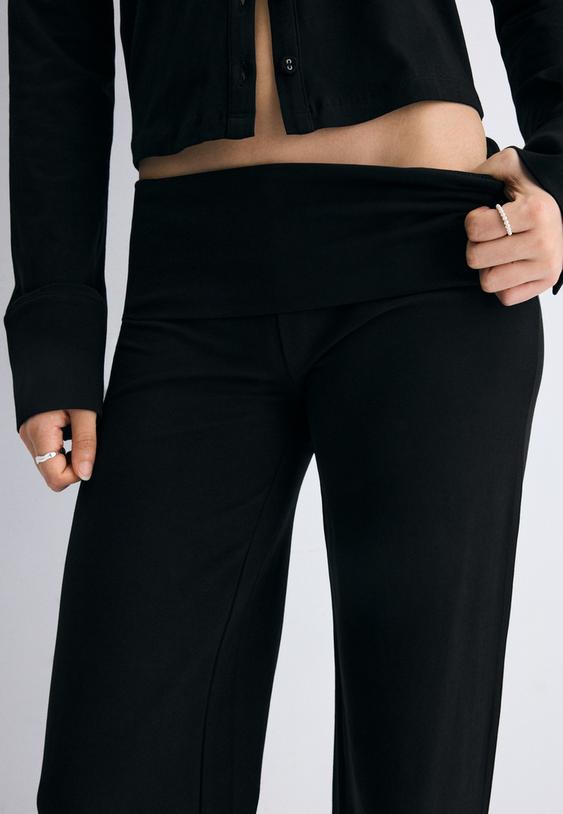 calcas de malha com cintura dobrada