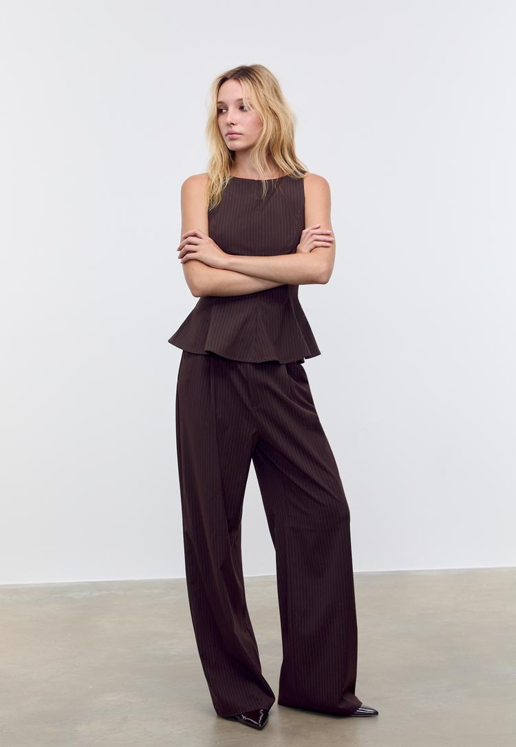 top peplum sin mangas rayas