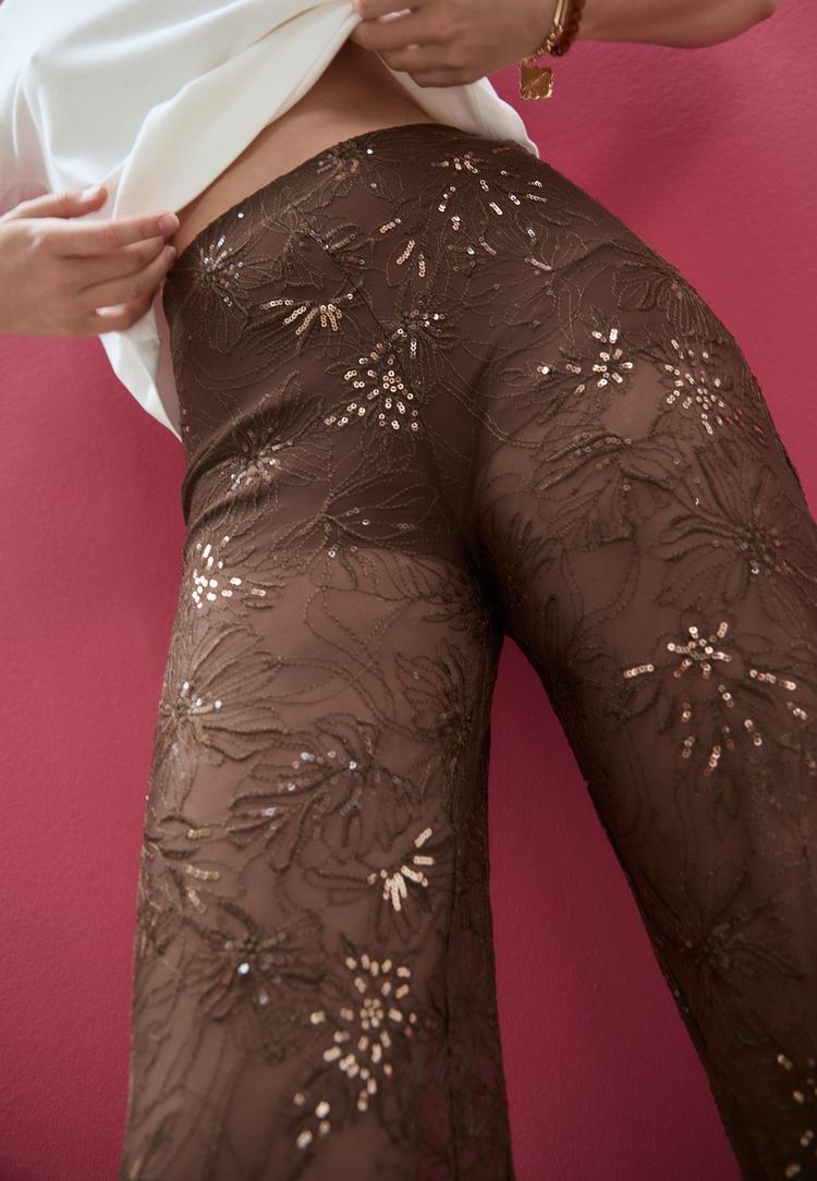 loose fitting trousers with sequinned embroidery
