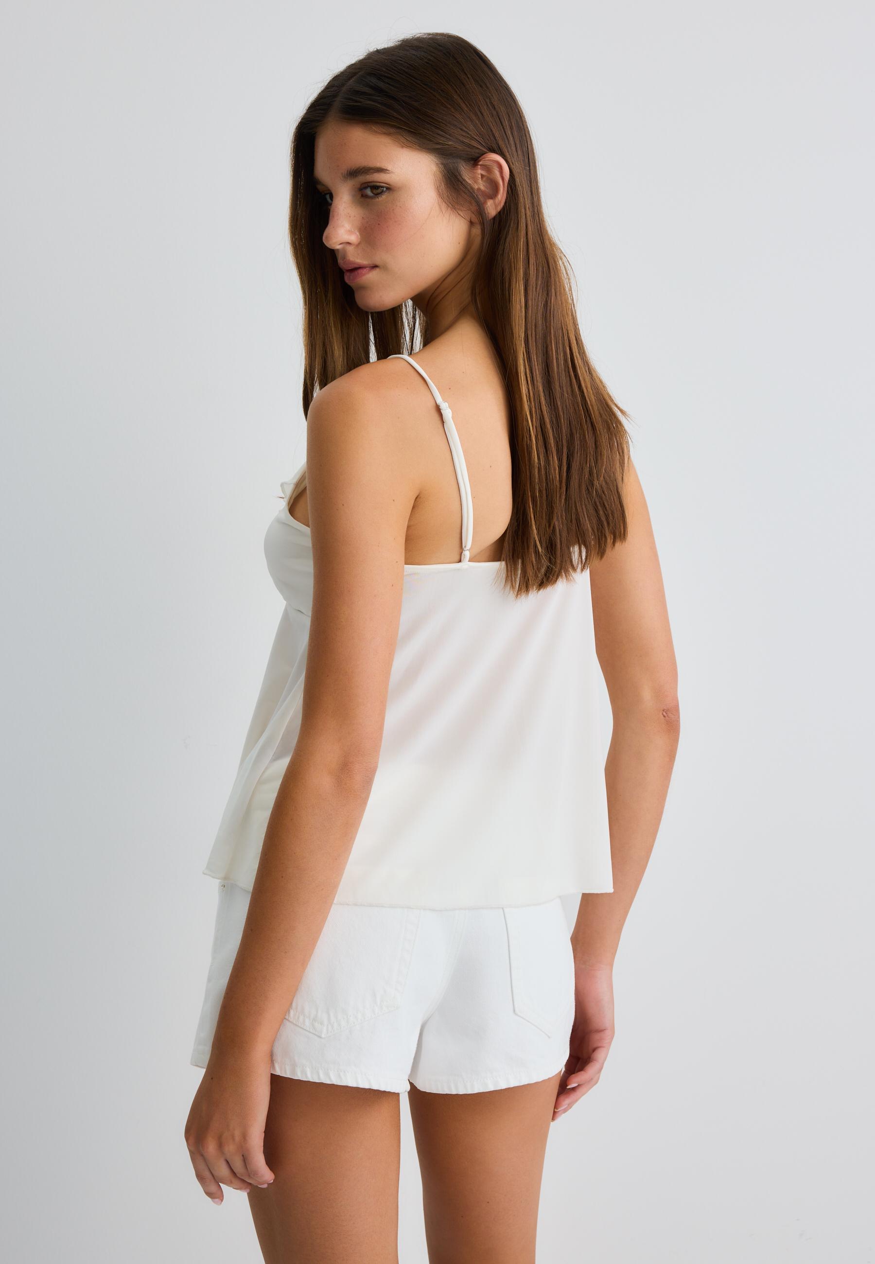 Ruffled strappy top — Ecru
