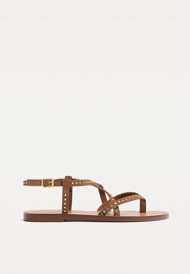 sandali bassi in pelle con borchie