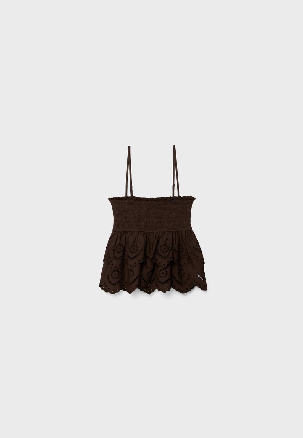 Embroidered ruffled top