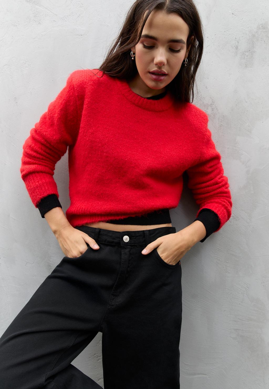 Knit sweater with shoulder pads