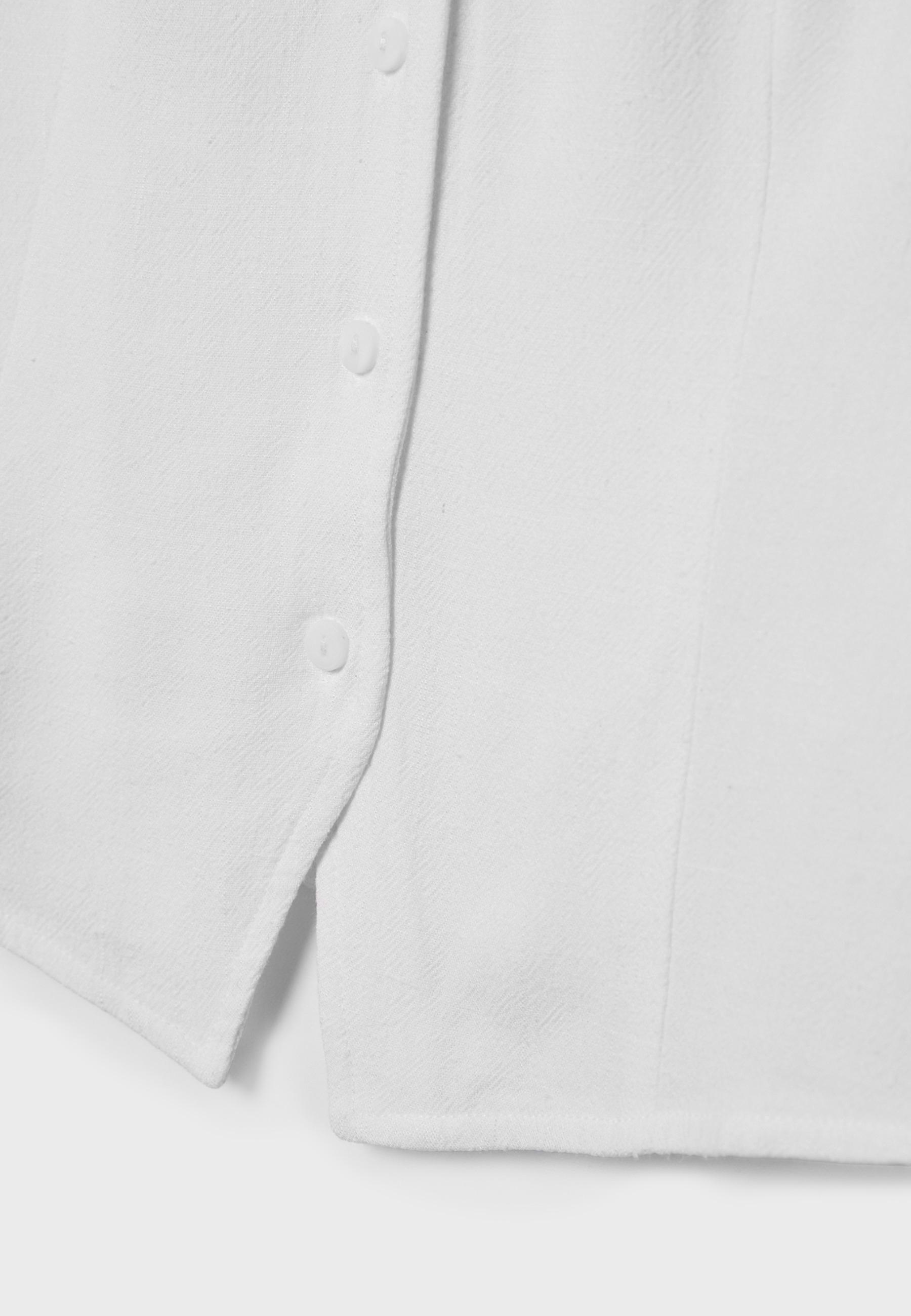 Sleeveless buttoned top — White
