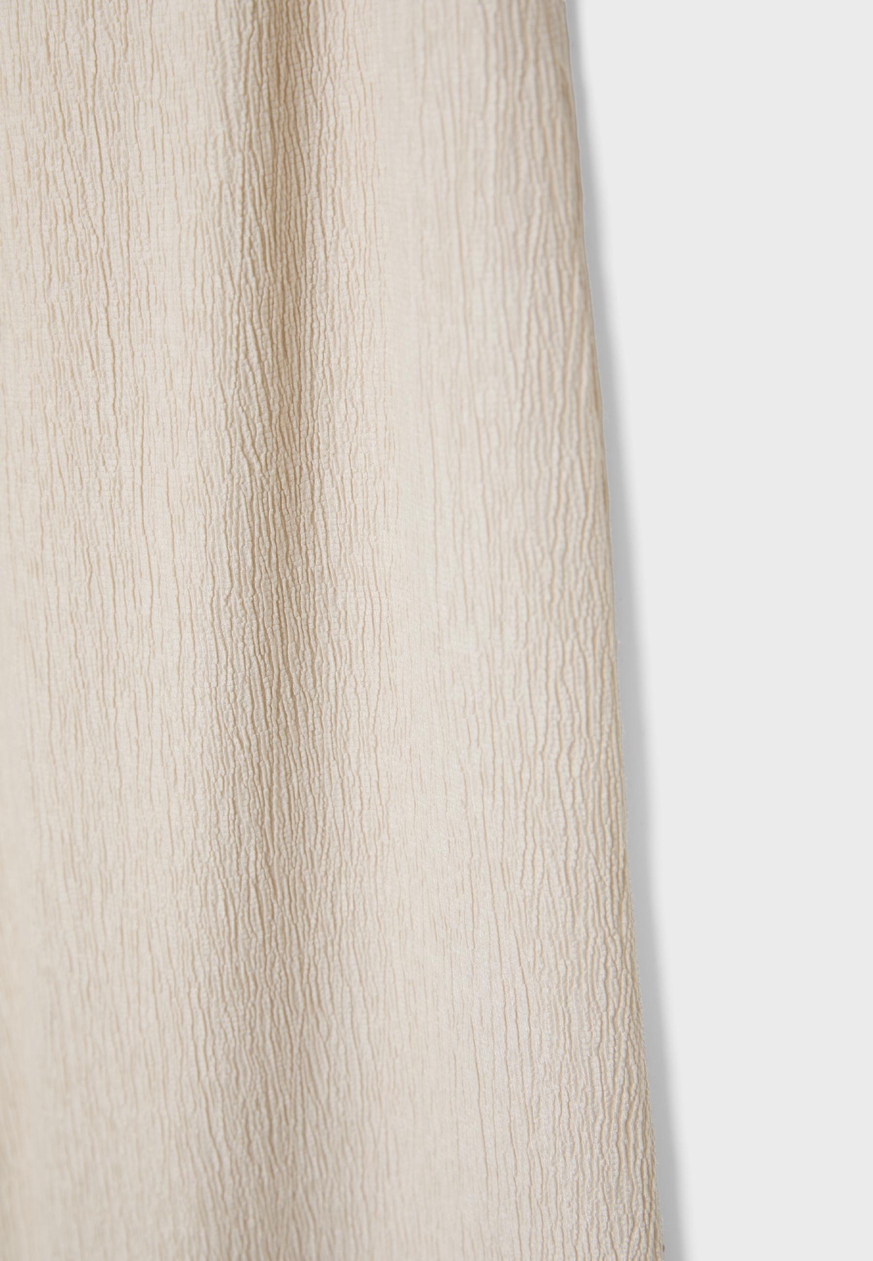 Straight-leg creased-effect trousers — Vanilla