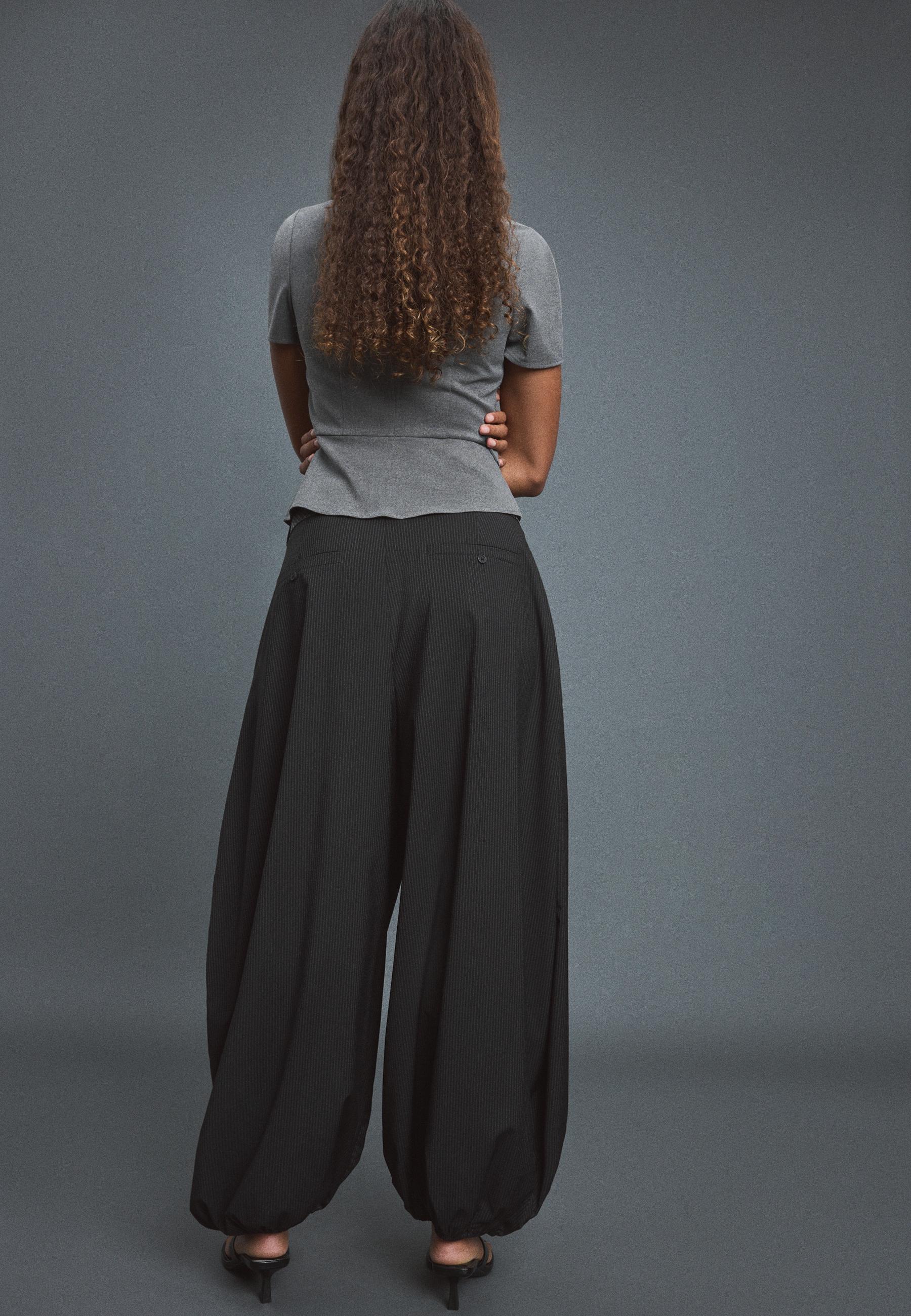 Voluminous tie-detail sarouel trousers — Black