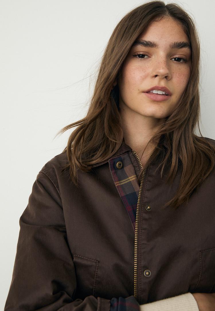 parka encerada multi bolsillos