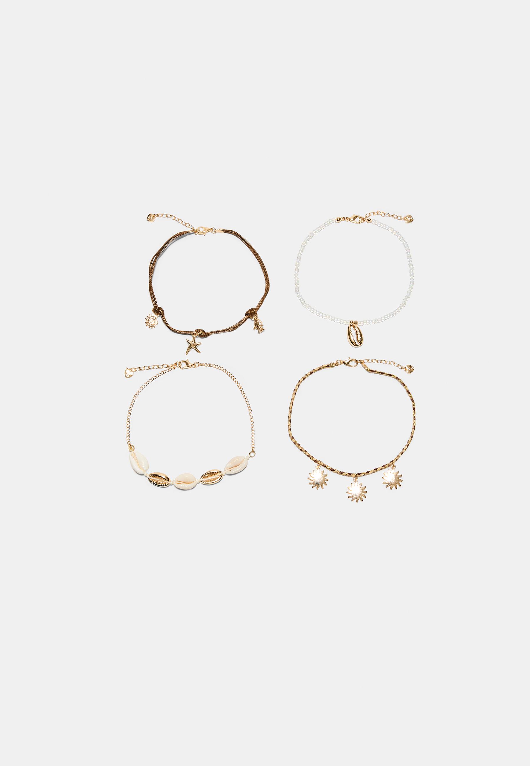 Set of 4 charm anklets — Gold