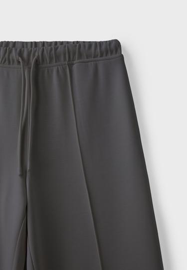 Soft-touch wide-leg jogger trousers with pin tuck — Grey 9