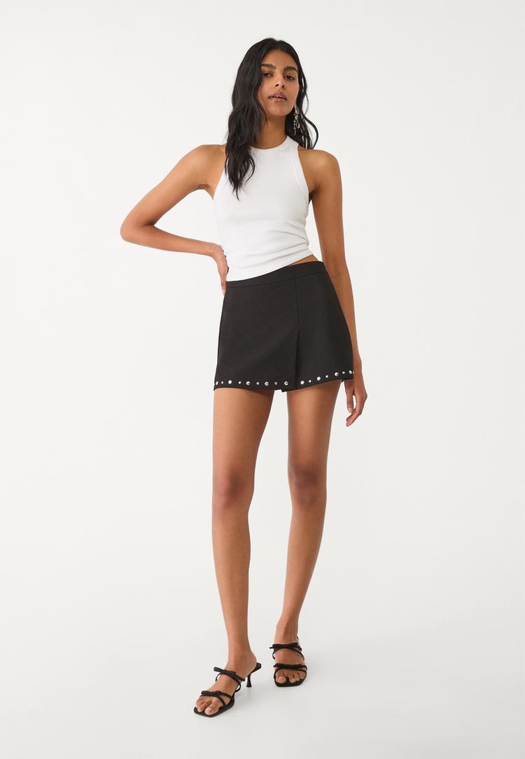 falda pantalon vestir tachas