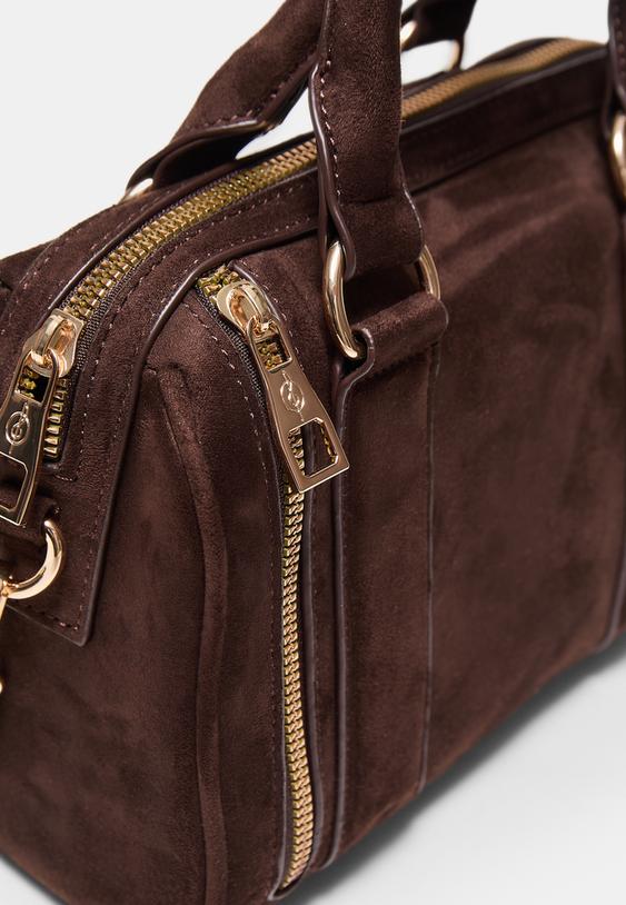 schoudertas met ritsdetails