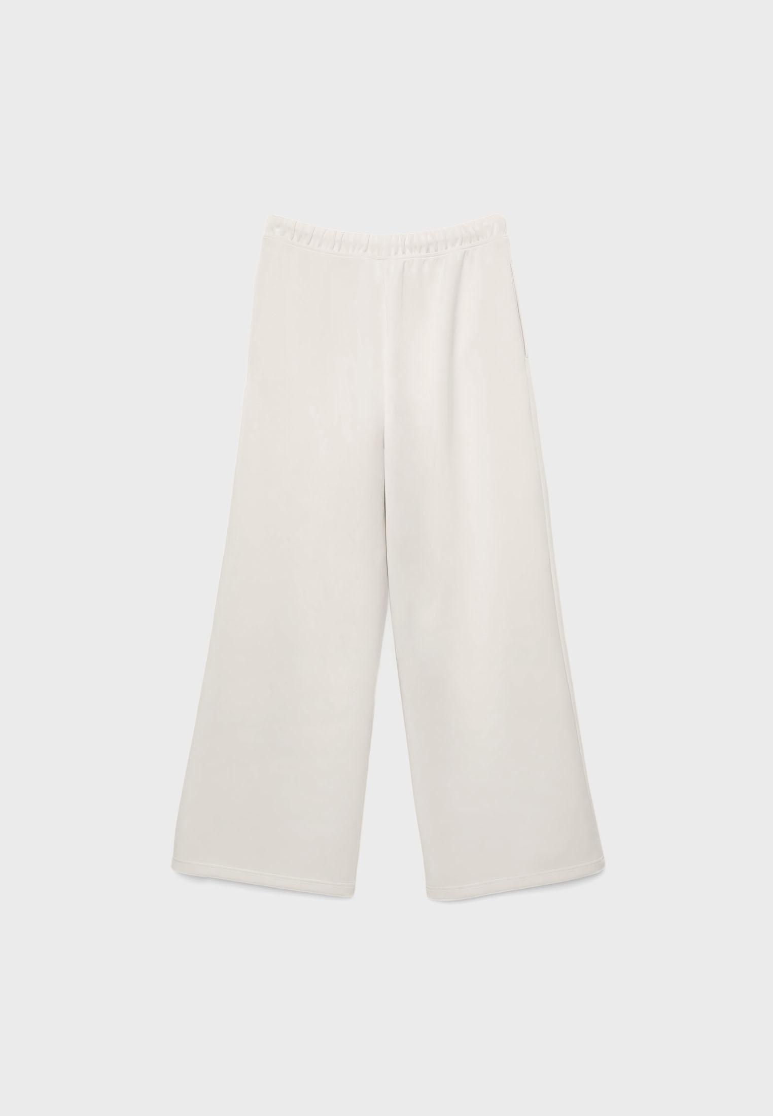 Soft-touch wide-leg pin-tuck joggers — Stone