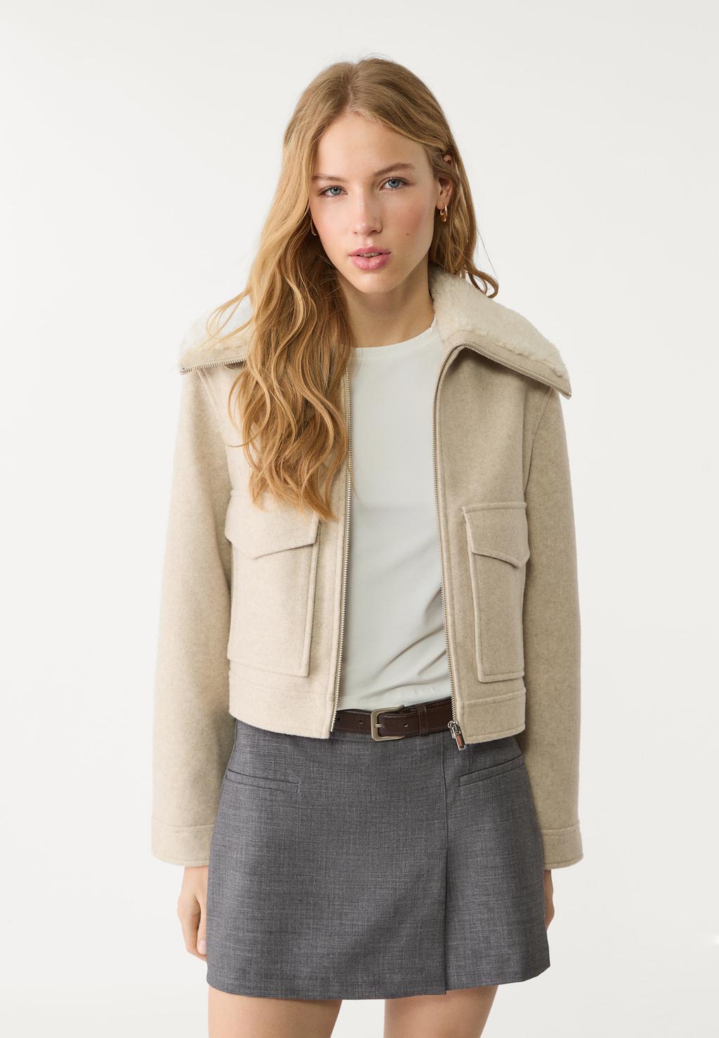 Short jacket with faux fur collar