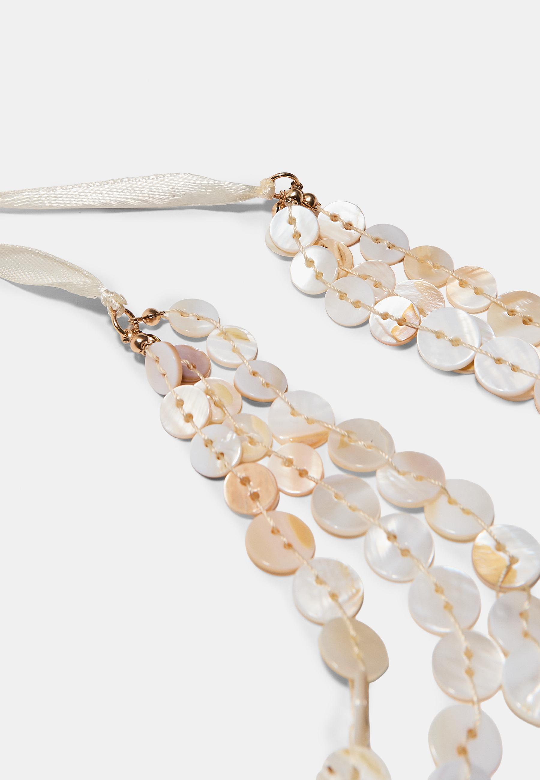 Multi-layered button necklace — Ecru