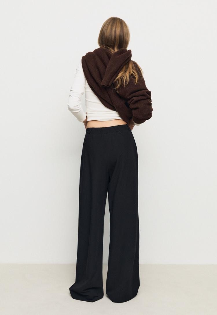 pantalon vestir ancho detalle hebilla