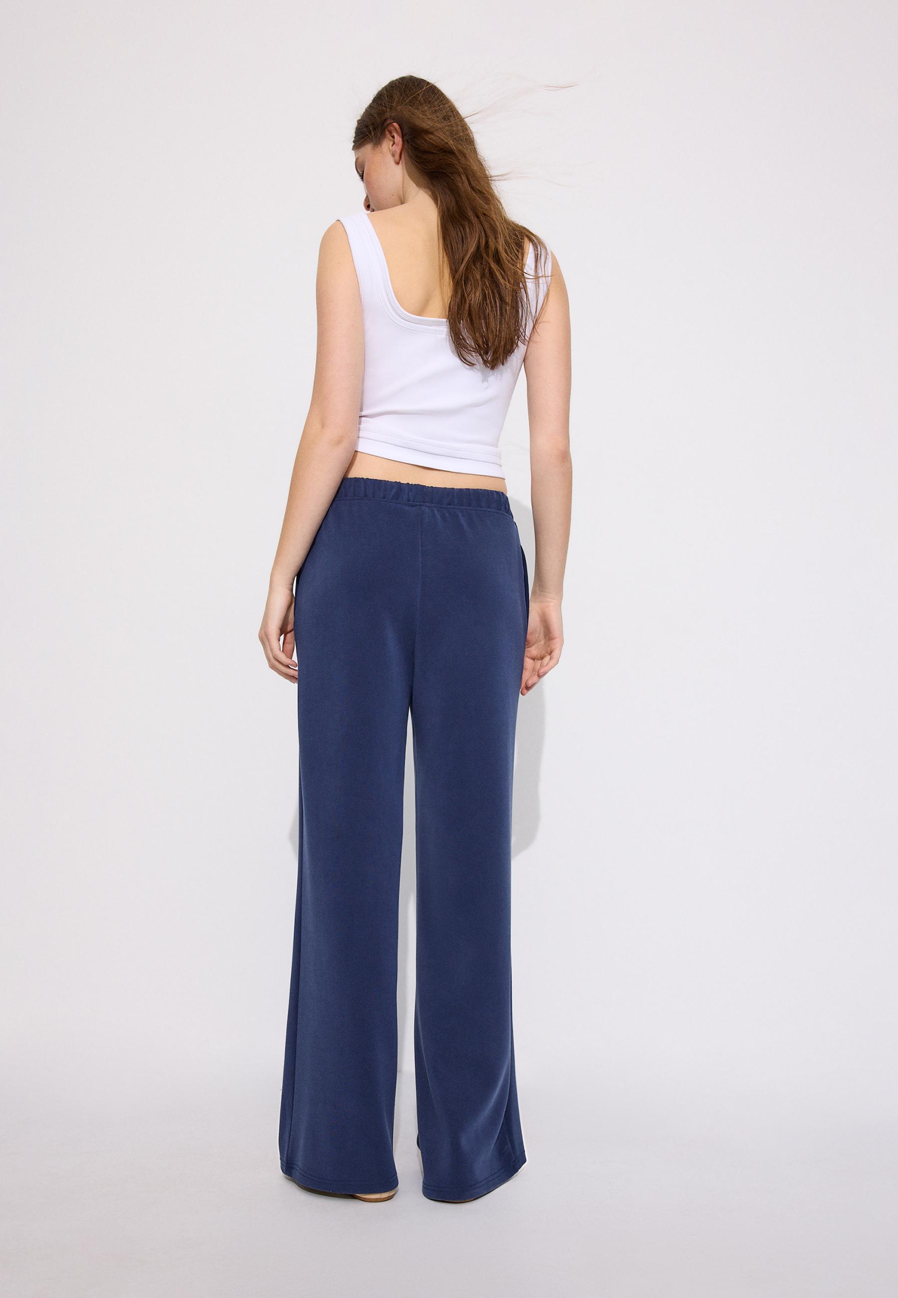 Soft-touch wide-leg pin-tuck joggers — Navy blue