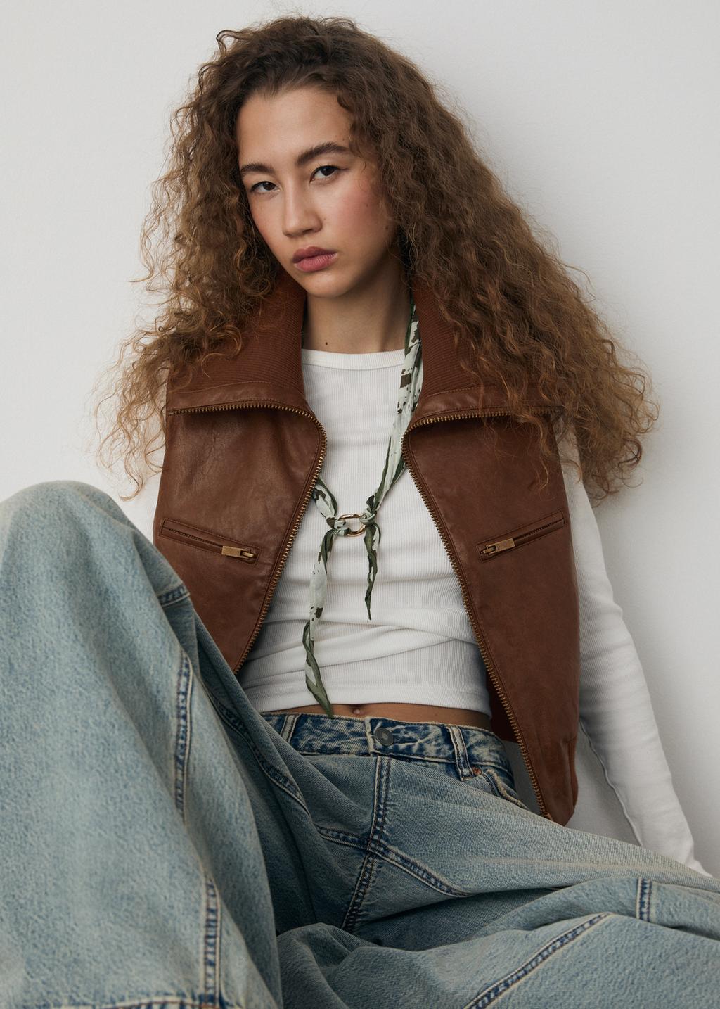 Gilet similicuir combiné maille côtelée