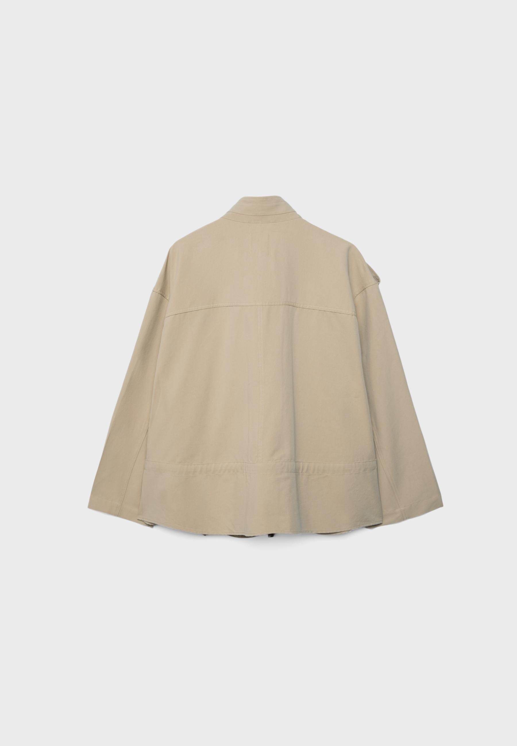 Fluid cropped jacket with front pockets — Stone
