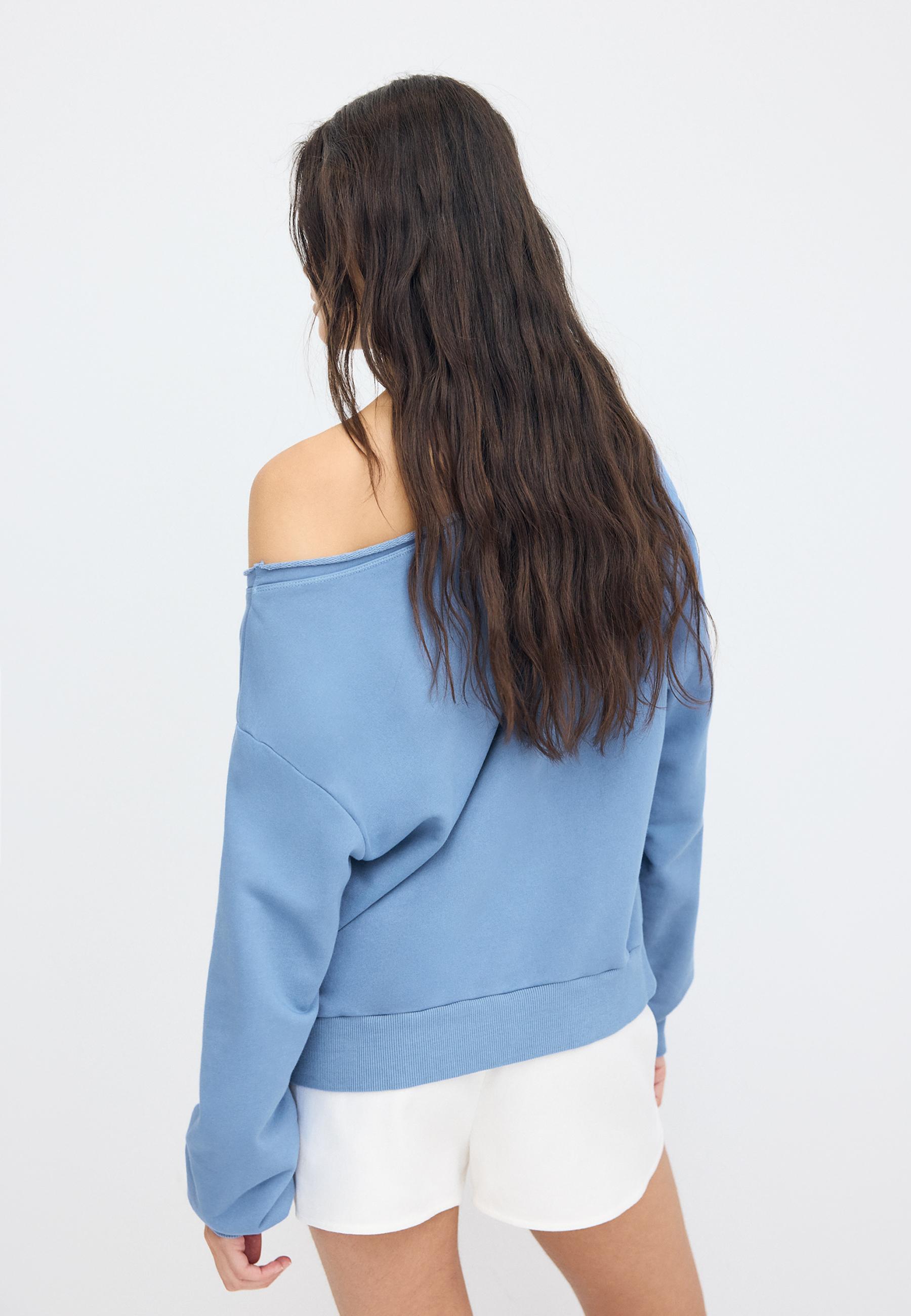 Boat neck sweatshirt with rhinestone wings — Sky blue