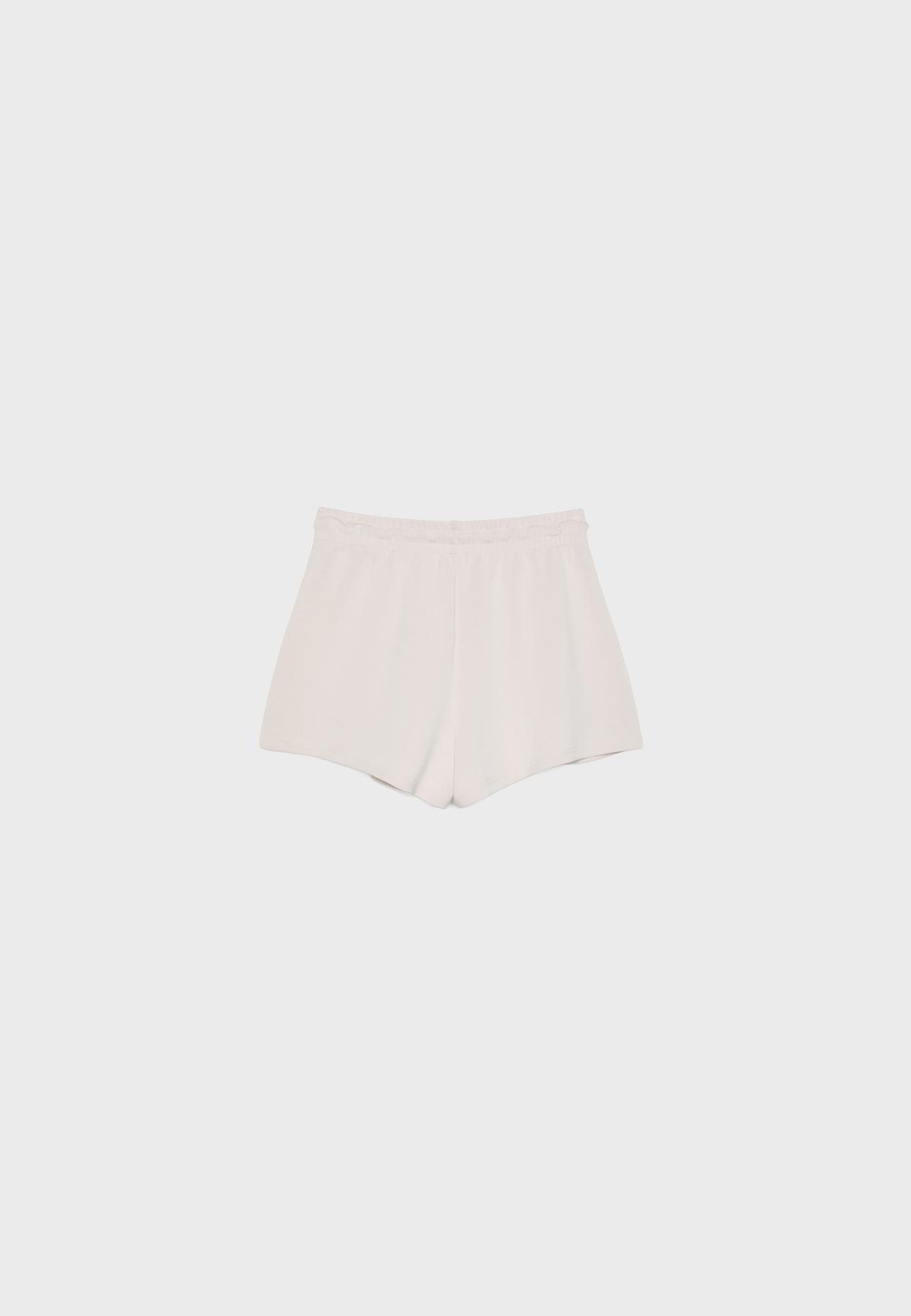 Soft-touch shorts with darts — Stone