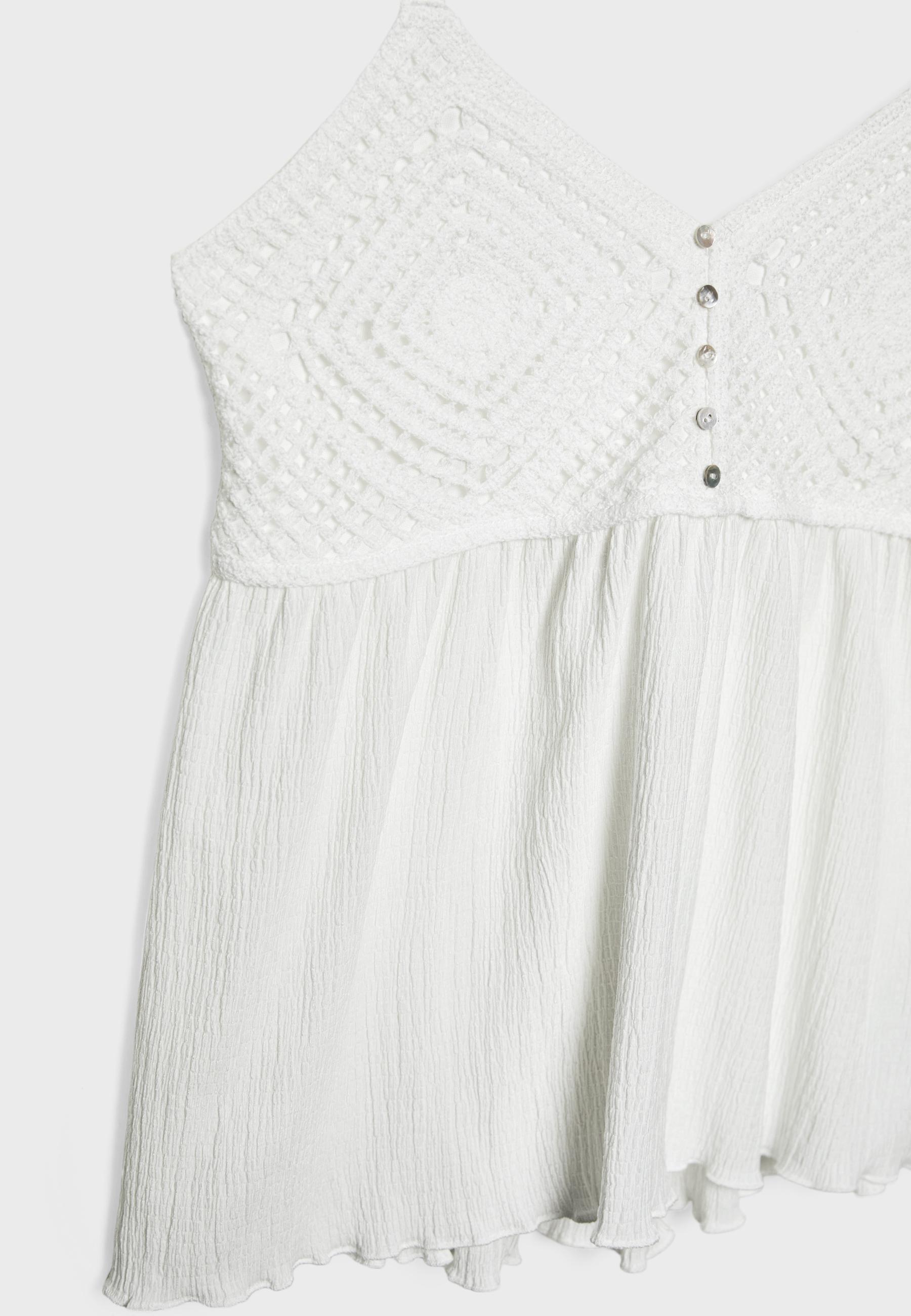 Ruffled crochet top — White