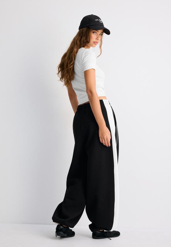 joggingbroek van fleece met stoppers en zijstreep