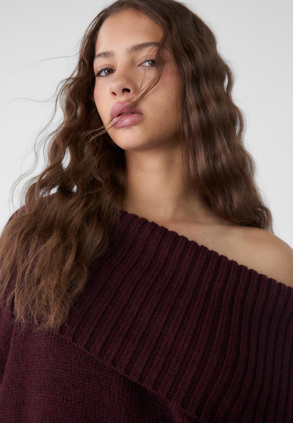 Exposed shoulder knit sweater