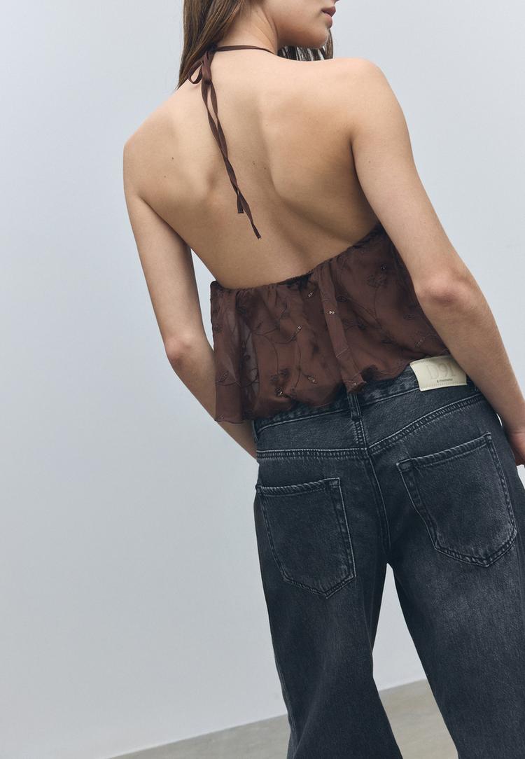 top a volants encolure americaine a paillettes