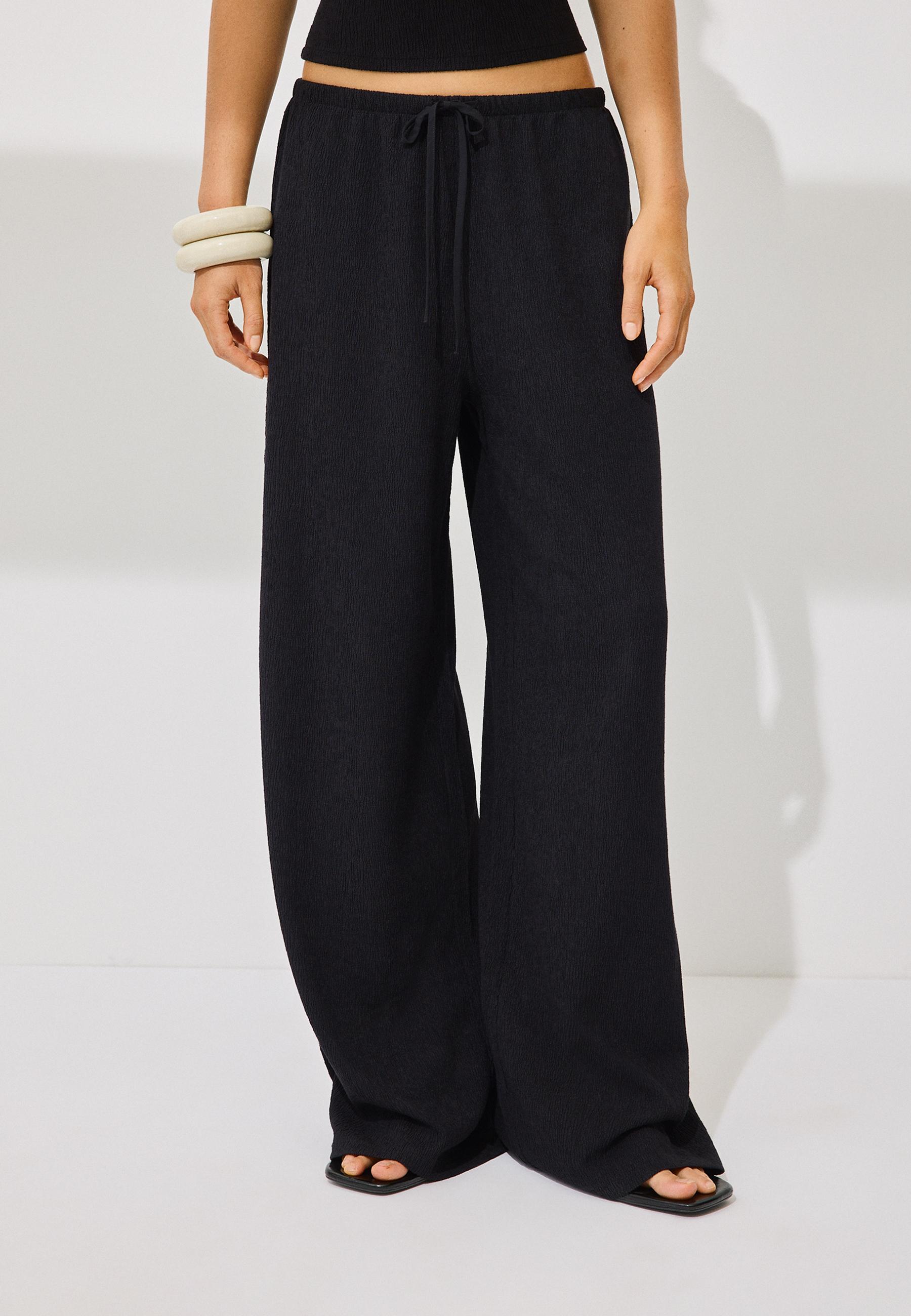Straight-leg creased-effect trousers — Black
