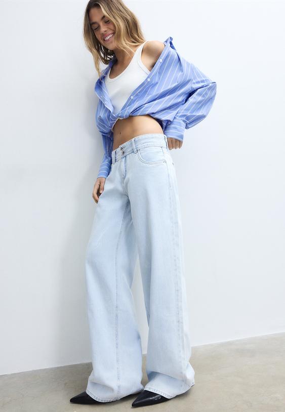 jeans de cintura baixa com botao duplo