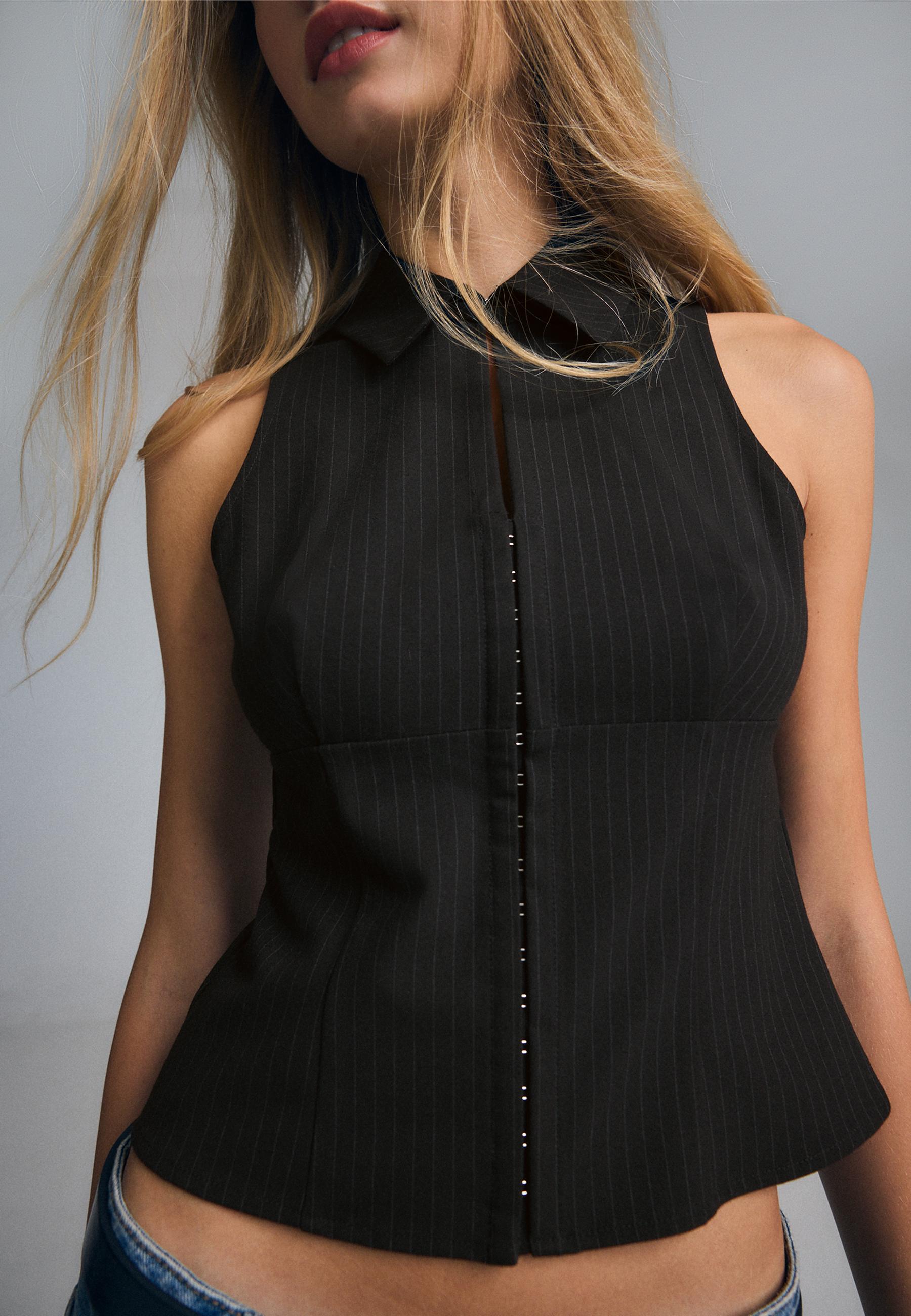 Sleeveless press stud top — Black
