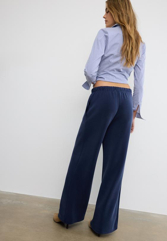 yumusak dokulu dikis detayl genis paca jogger pantolon