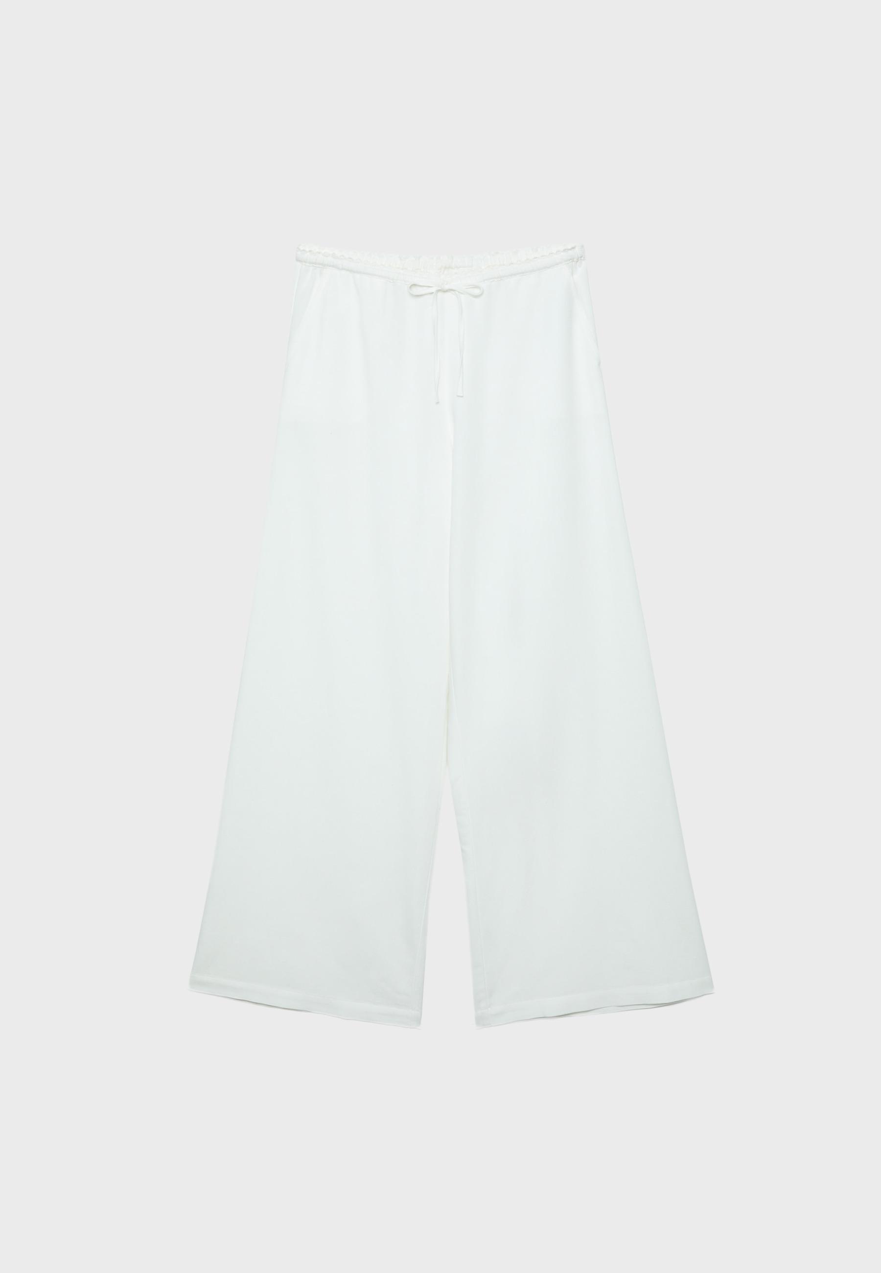 Wide-leg linen-effect trousers — Ecru