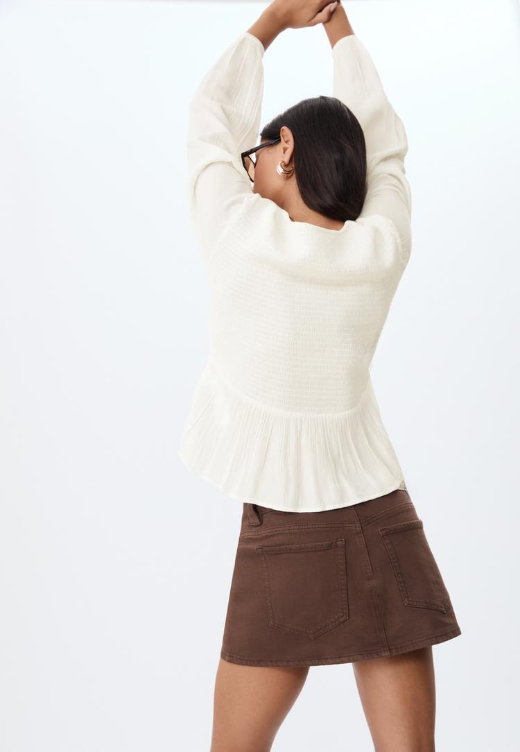 blusa fluida manga larga