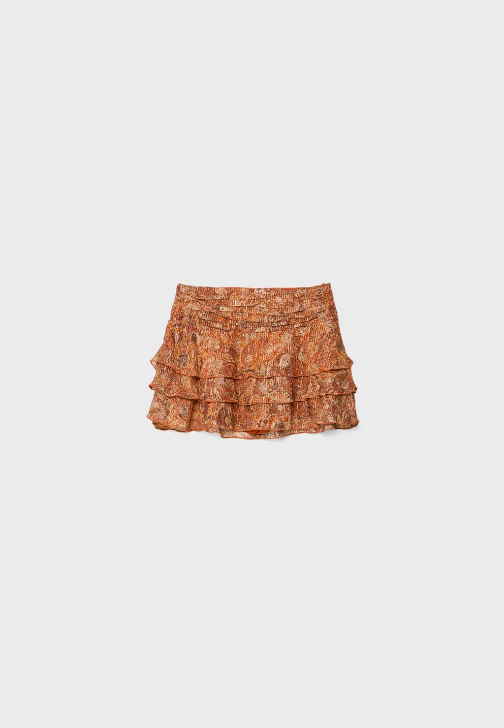 Voľný volánový mini skort
