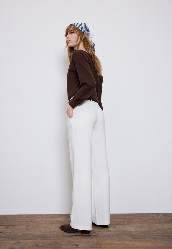 pantaloni fluidi dritti eleganti con cintura