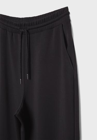 Soft-touch palazzo jogger trousers — Black 7