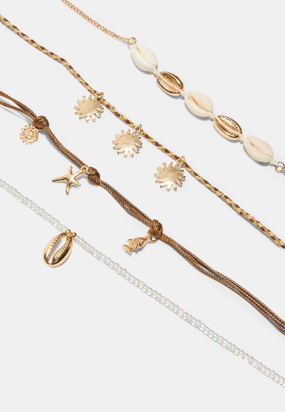 set de 4 tobilleras charms