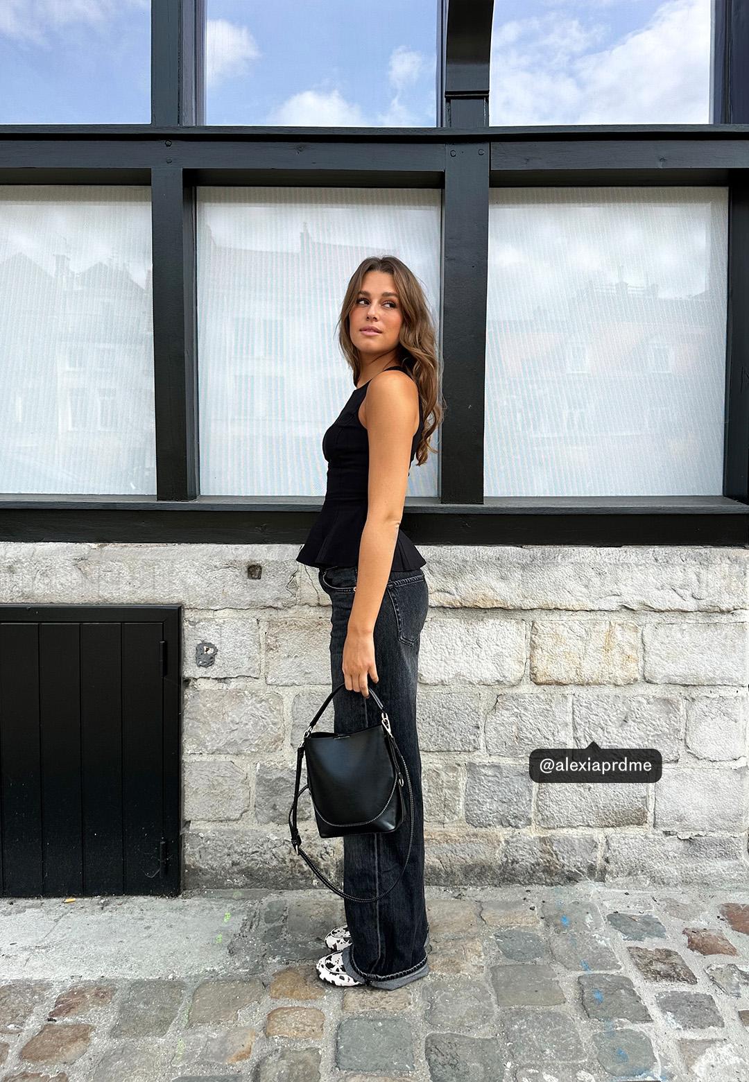 Sleeveless peplum top — Black