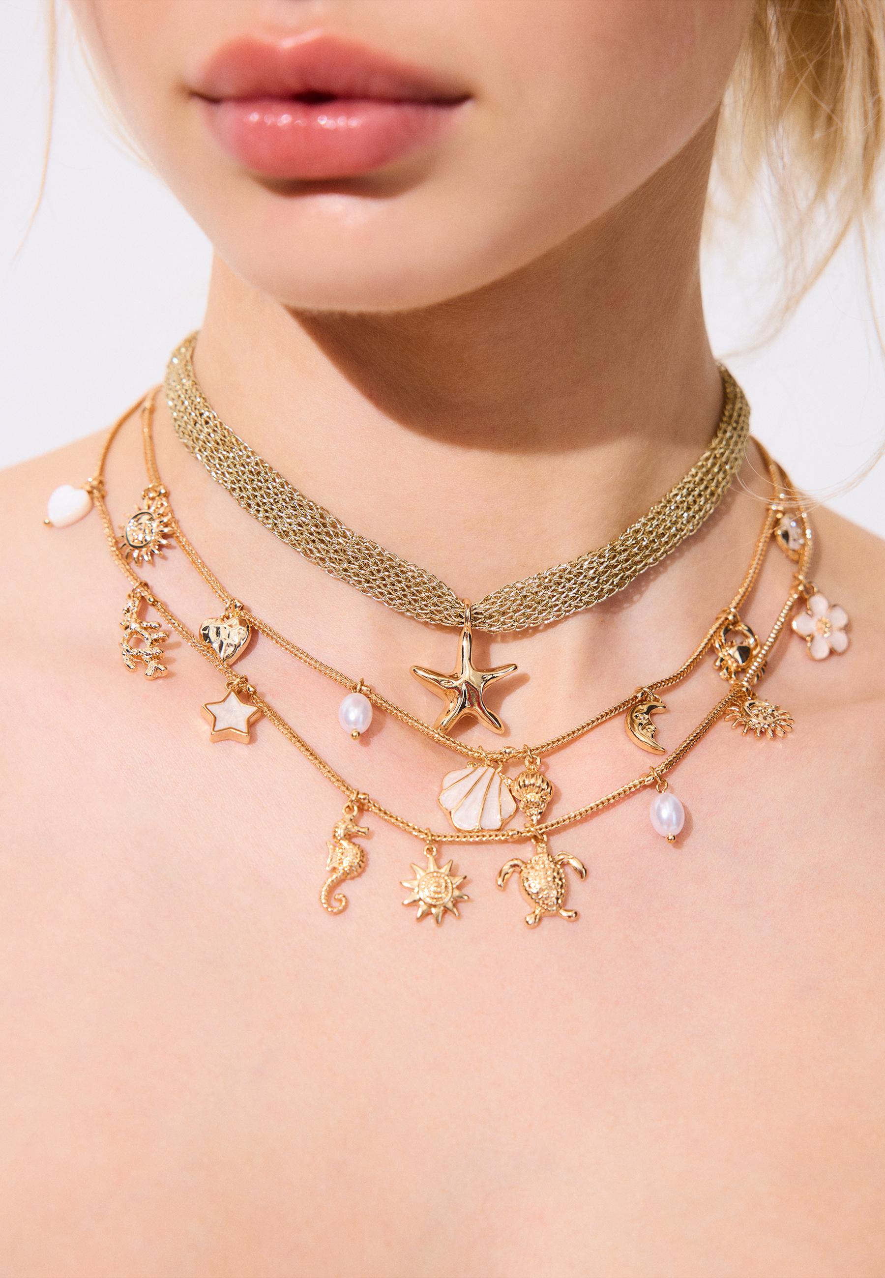 Set of 2 marine charm necklaces — Gold