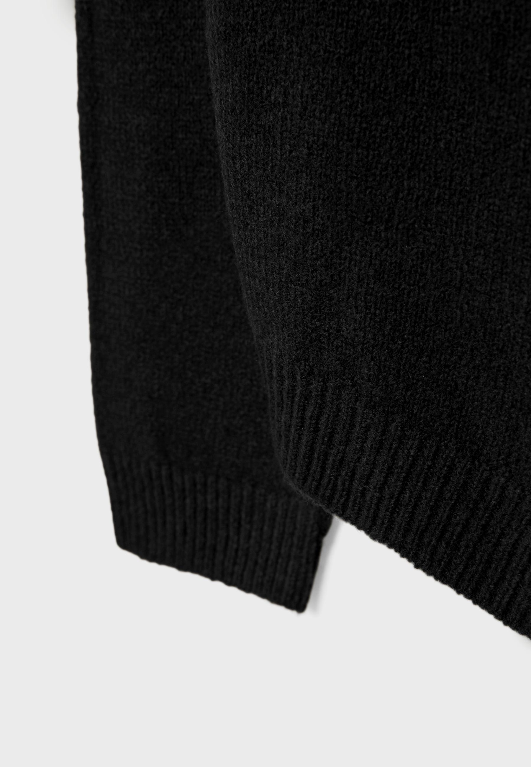 Asymmetric knit sweater — Black